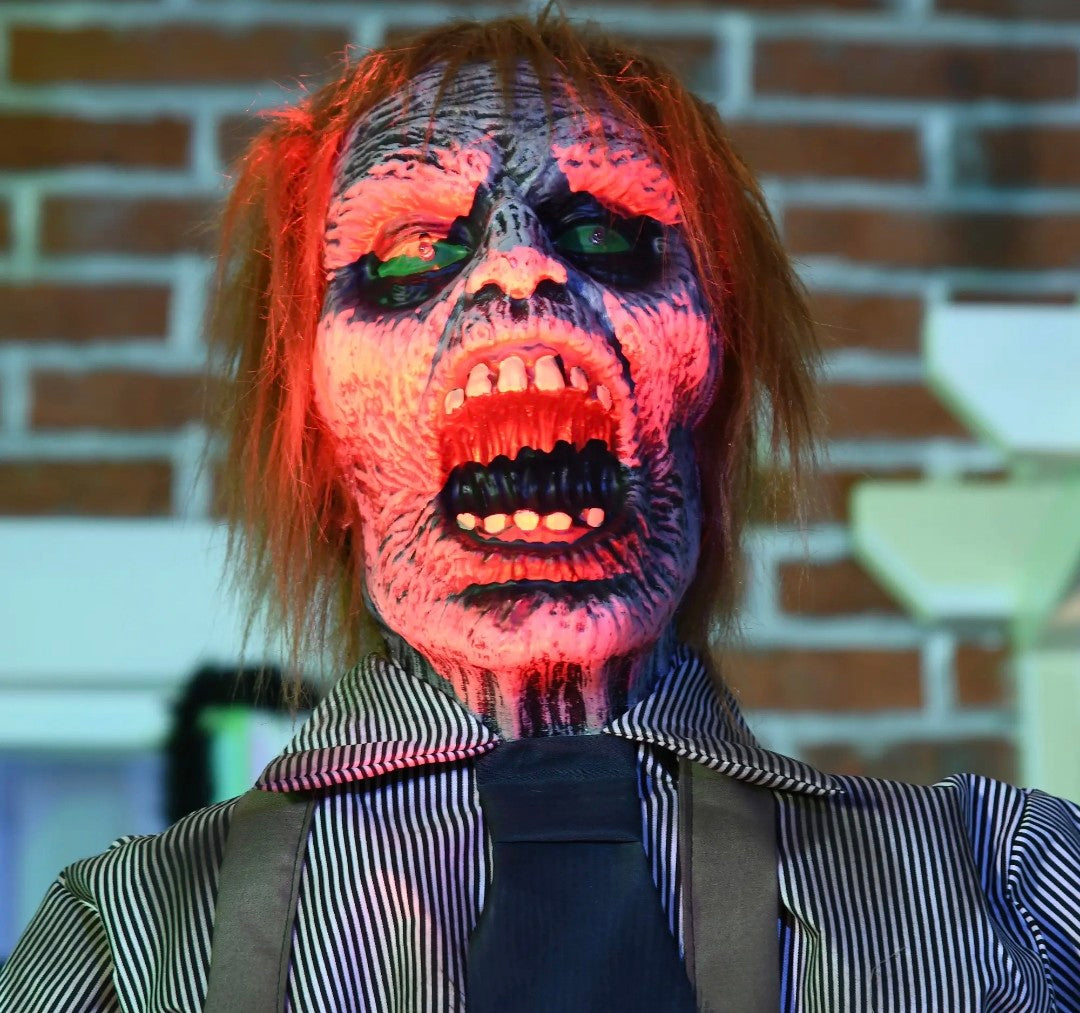 Animatronic Life-Size Chainsaw Killer Halloween Decoration | Light-Up Eyes, Sound Activated Moving Body | 5.5ft